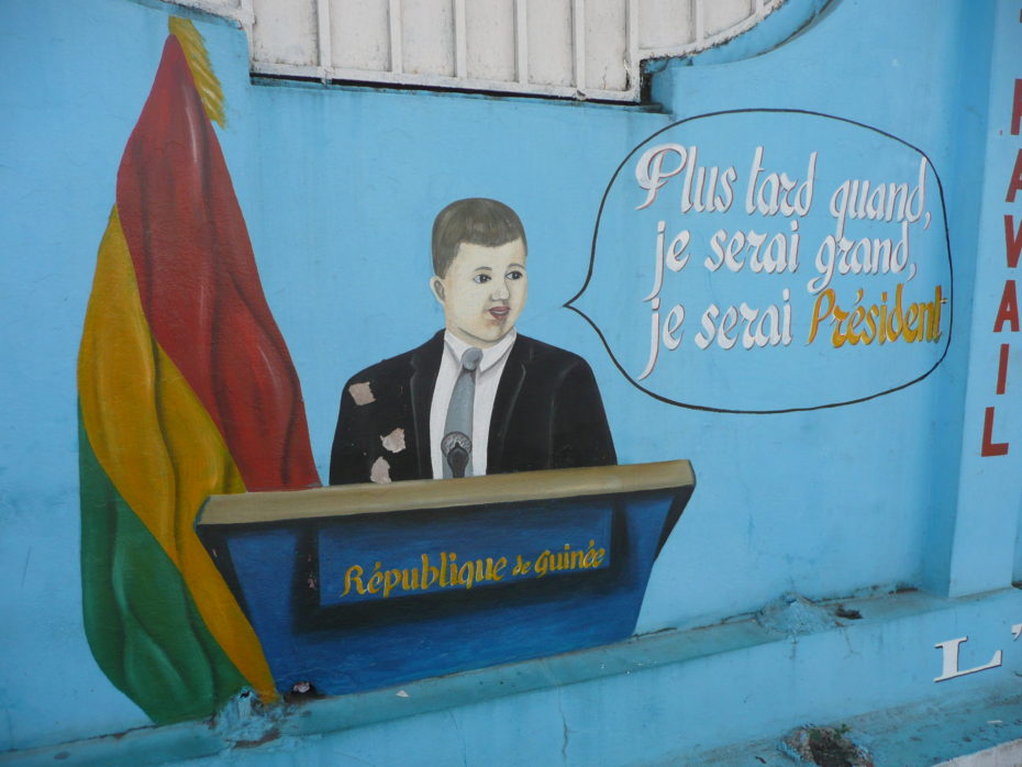 "When I grow up I will be President". Motivating mural on school wall in Conakry, Guinea.