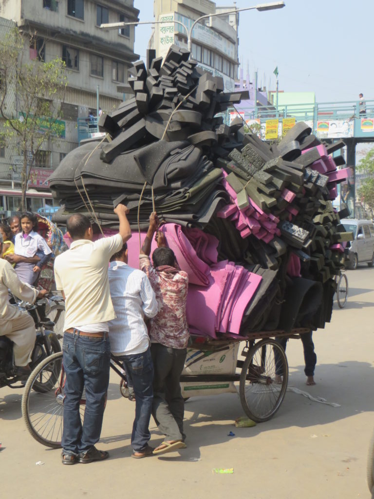 And the winner for most crap piled onto a rickshaw is.......