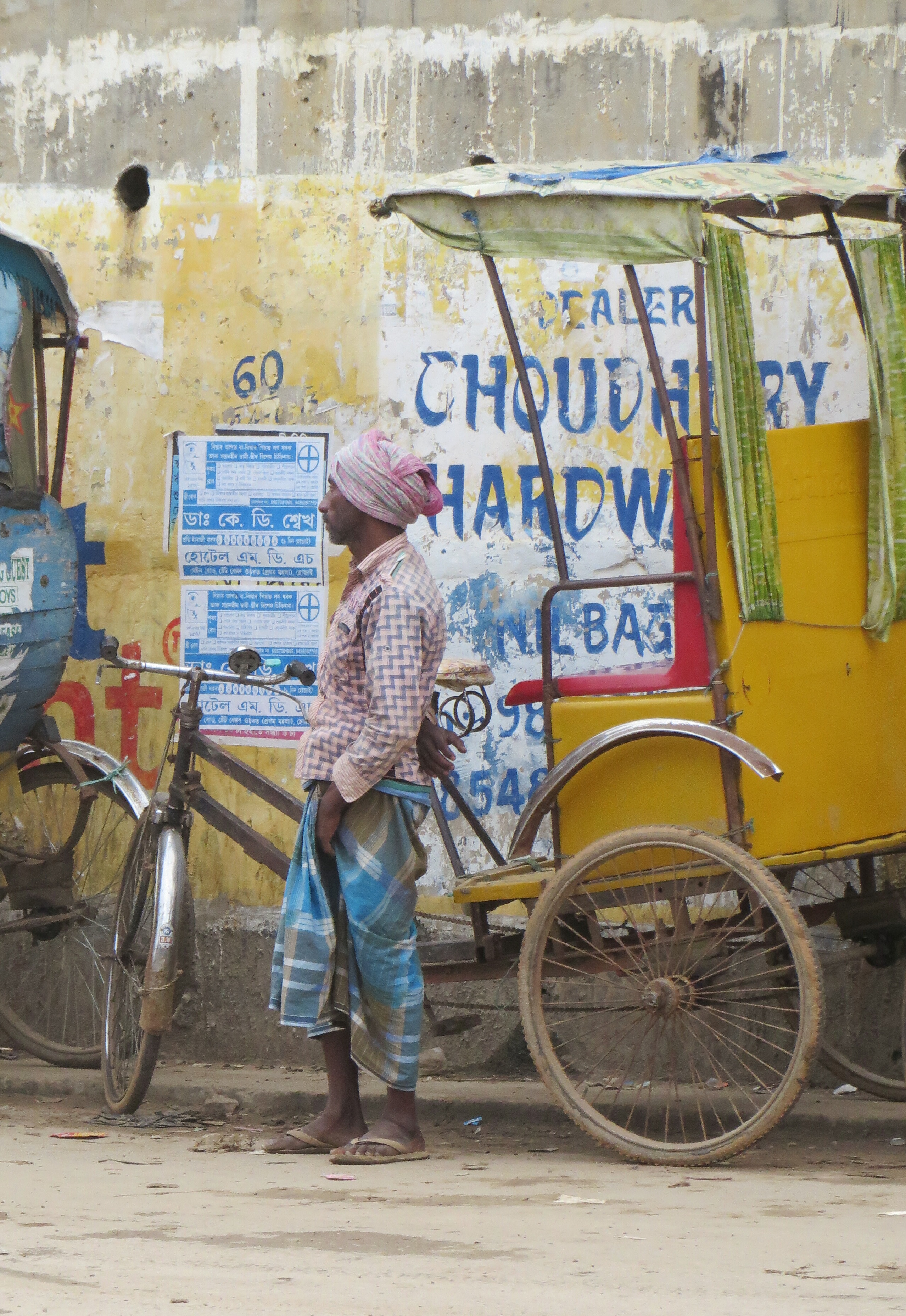 Deespite the often rugged terrain the rickshaw still remians a vital form of transportl